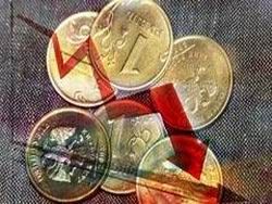 Девальвация рубля возможна уже летом